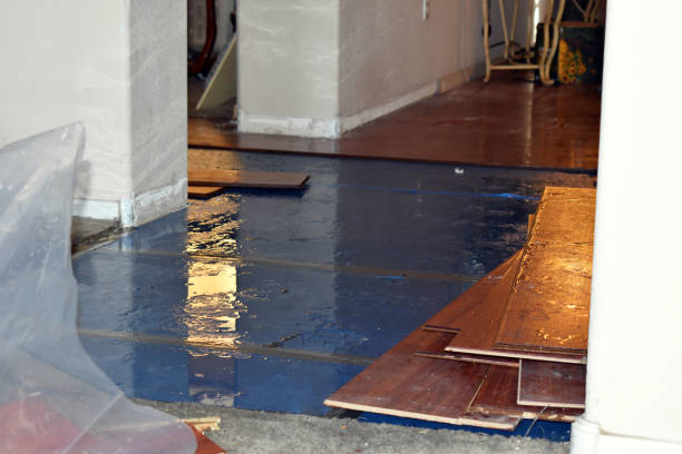 Professional Flood Damage Restoration technician working in Perrysville, OH